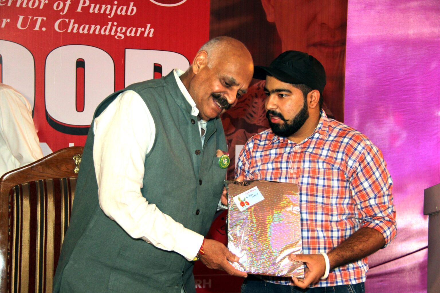 Blood donors awarded by UT Administrator Badnore