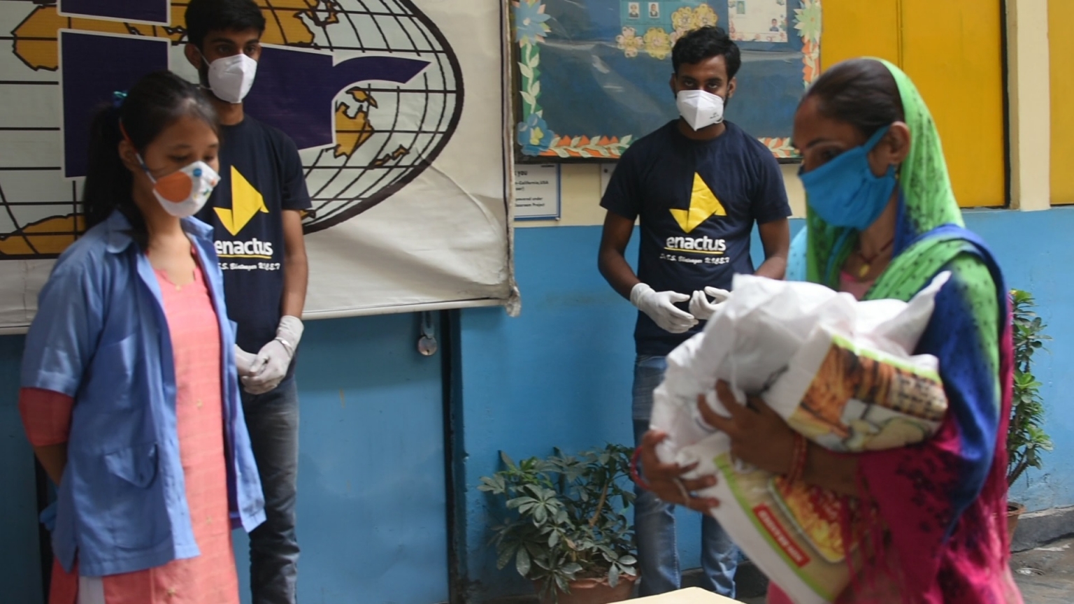 ENACTUS PU TEAM AND DIR DISTRIBUTES FACE MASKS AND RATION KITS TO THE IMPOVERISHED