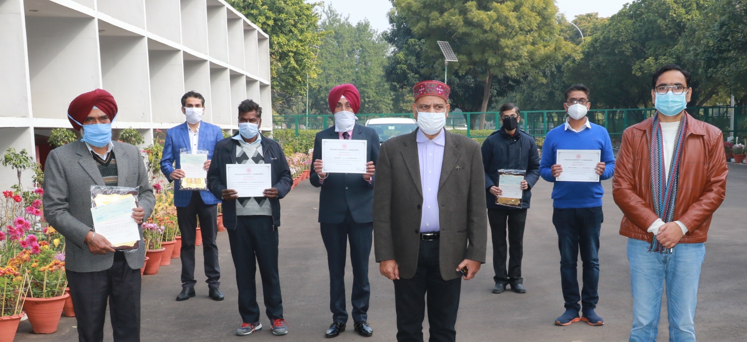 PU VC felicitates Employees for Commendable Work